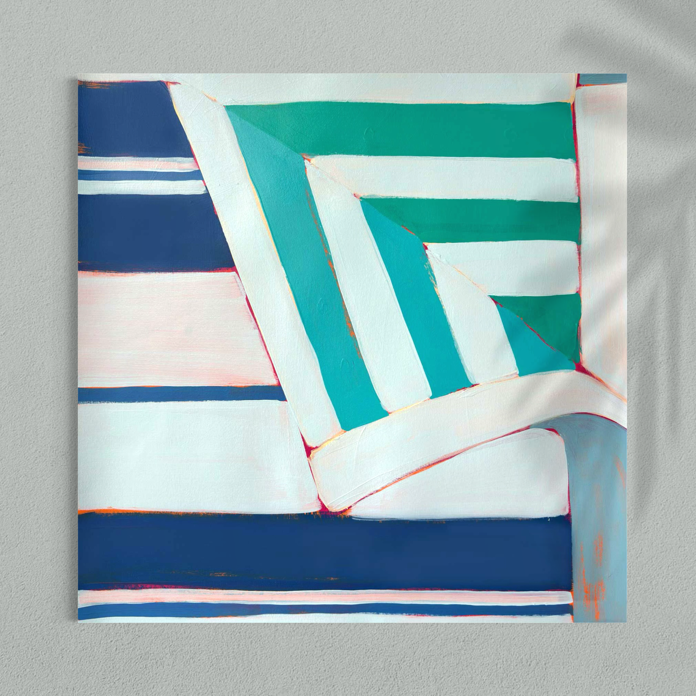 Abstract wall art shows stacked teal-green and white panels with a blue striped section, outlined by thin red edges on a textured surface.