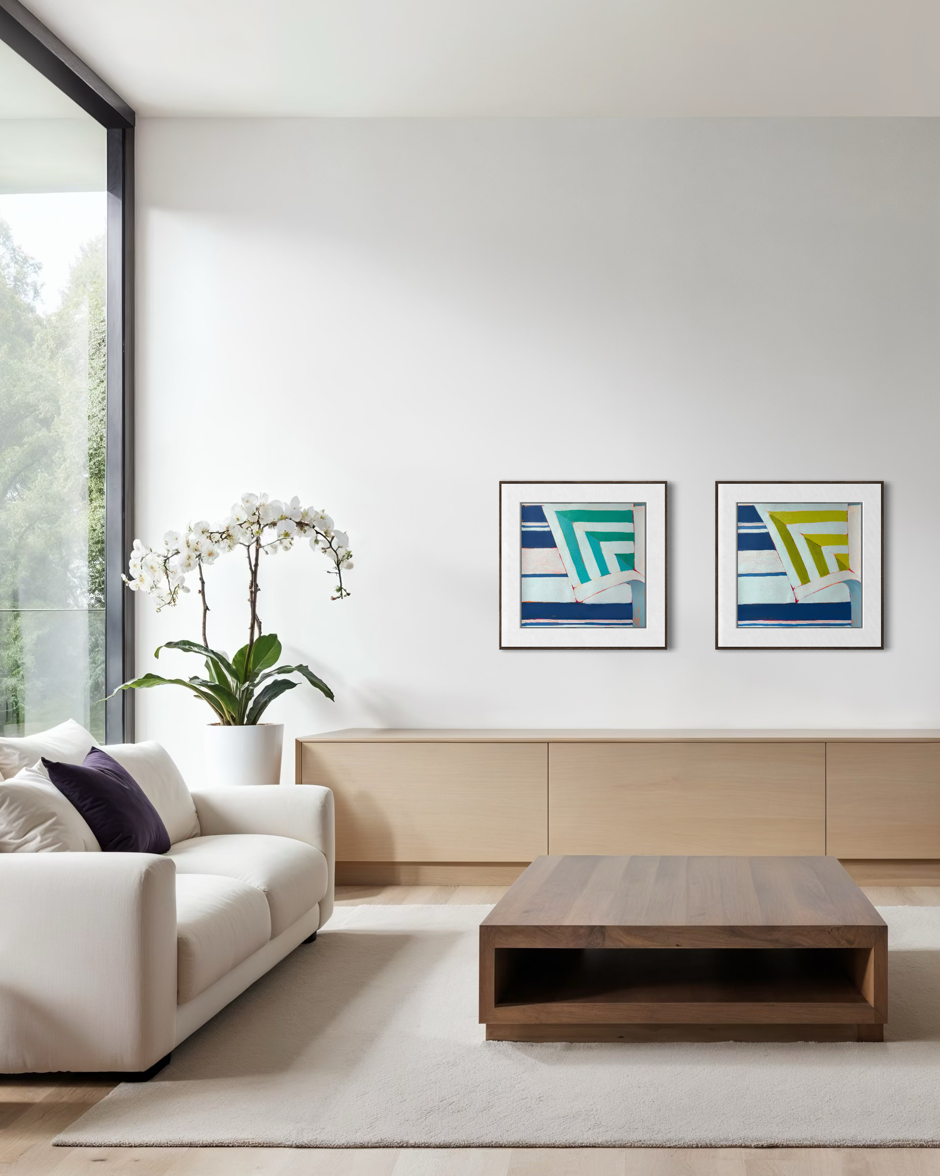 Living room corner with a white sofa, a potted orchid by a large window, and two framed abstract artworks with blue, green, and yellow sails.
